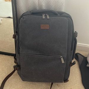 campus/travel backpack with laptop space, adjustable buckles, and four pockets